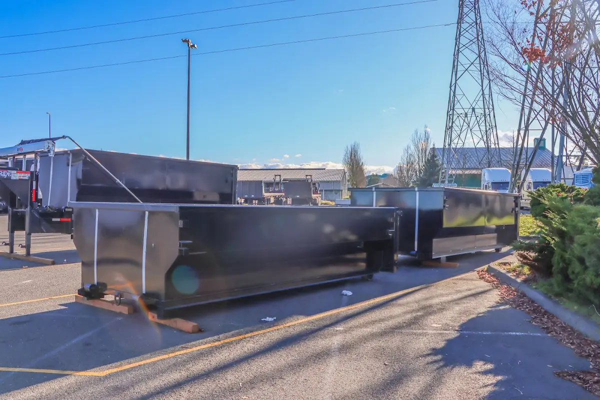 Roll-off dumpster ready for waste disposal at job site for Demolition Dumpster Rental in Lewistown